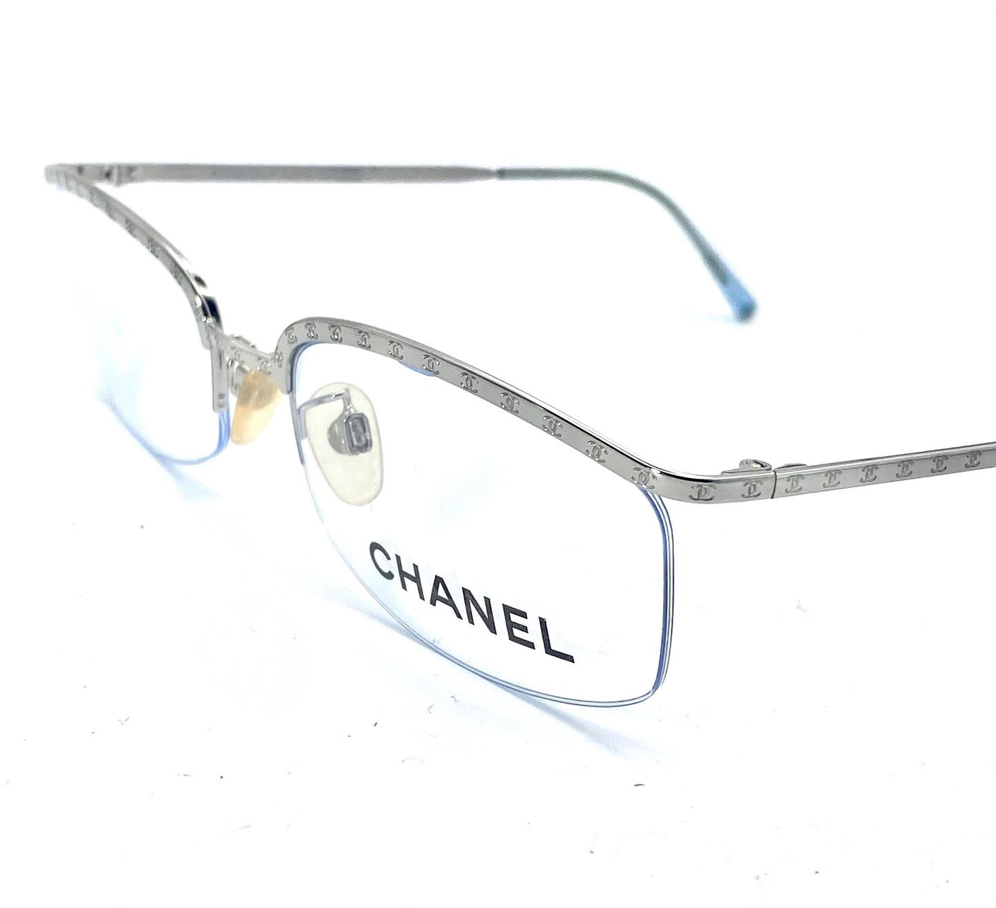 Chanel modernist half rim silver glasses w CC logo carved allover, NOS early Y2K mint