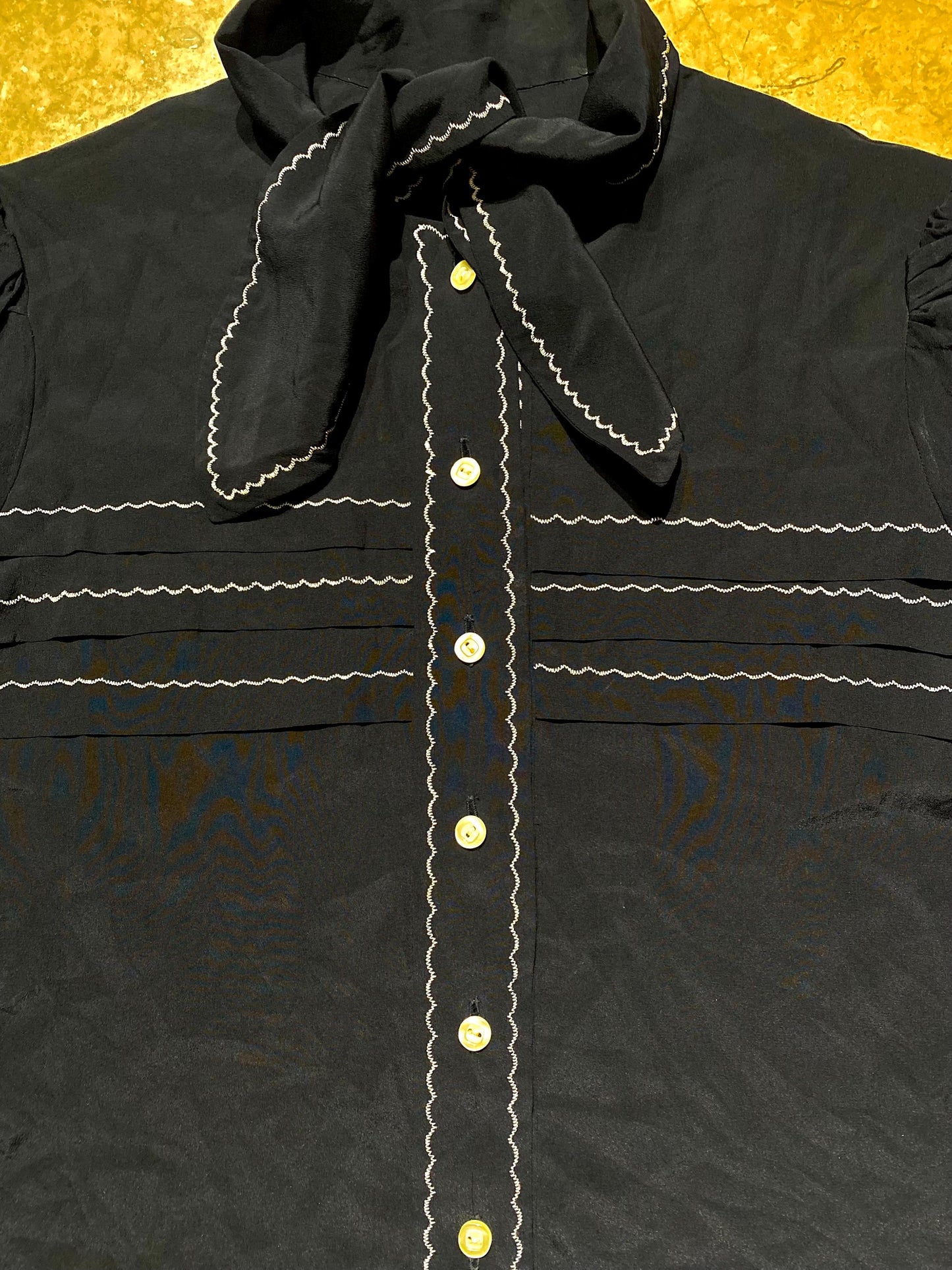 1950s tailor made black silk pin-up blouse w pleats, embroidered details and bow collar, perfect condition