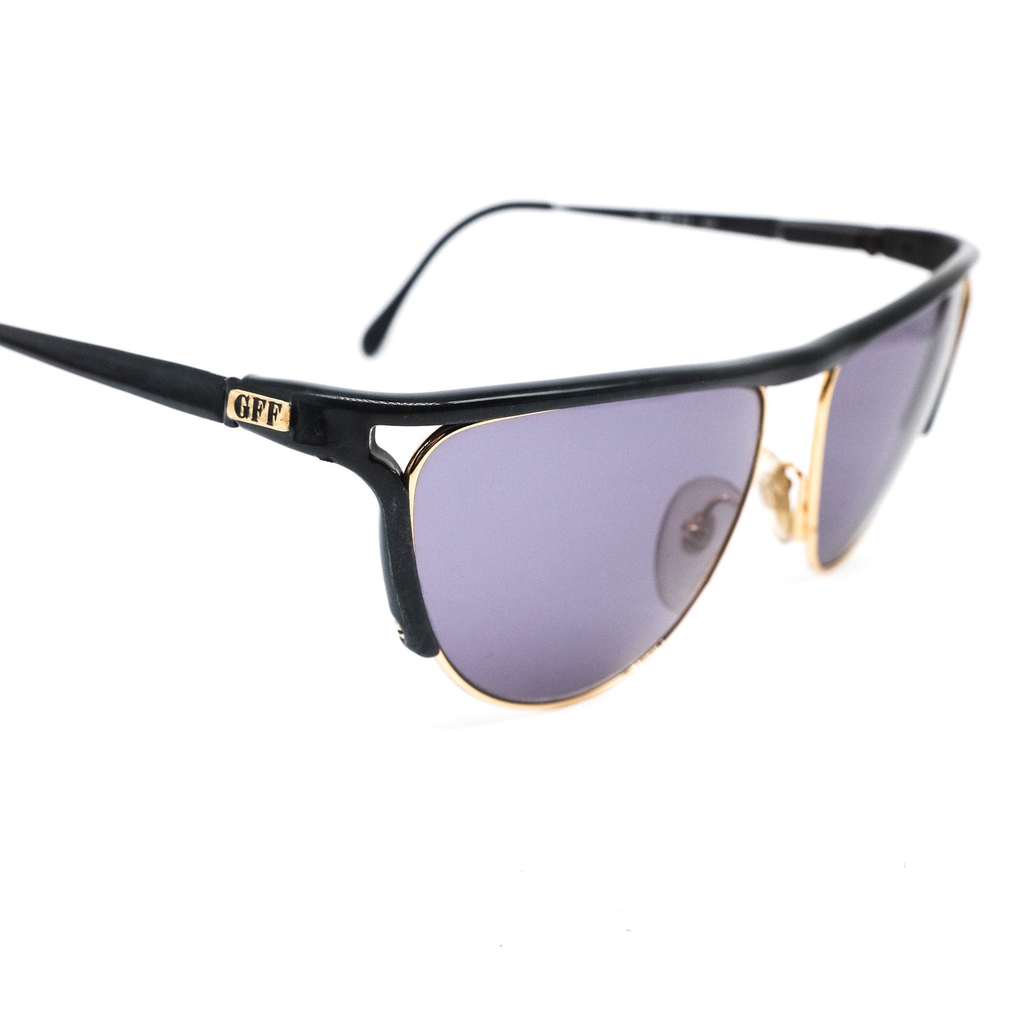Gianfranco Ferré GFF51 cateye sunglasses with golden metal rim and black acetate browline and temples. Made in Italy, 1980s nos