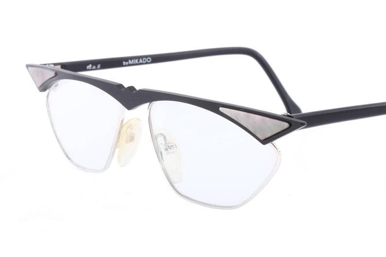 MIKADO modernist cateye frames in matt black metal w pointed brows & pearl inserts, Germany NOS 80s