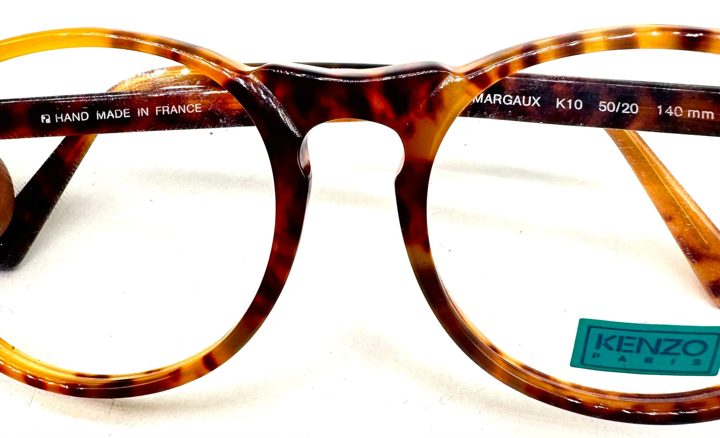 Kenzo K10 montatura per occhiali da vista tonda demi bionda con ponte buco della serratura fatta a mano in Francia, anni '80 NOS