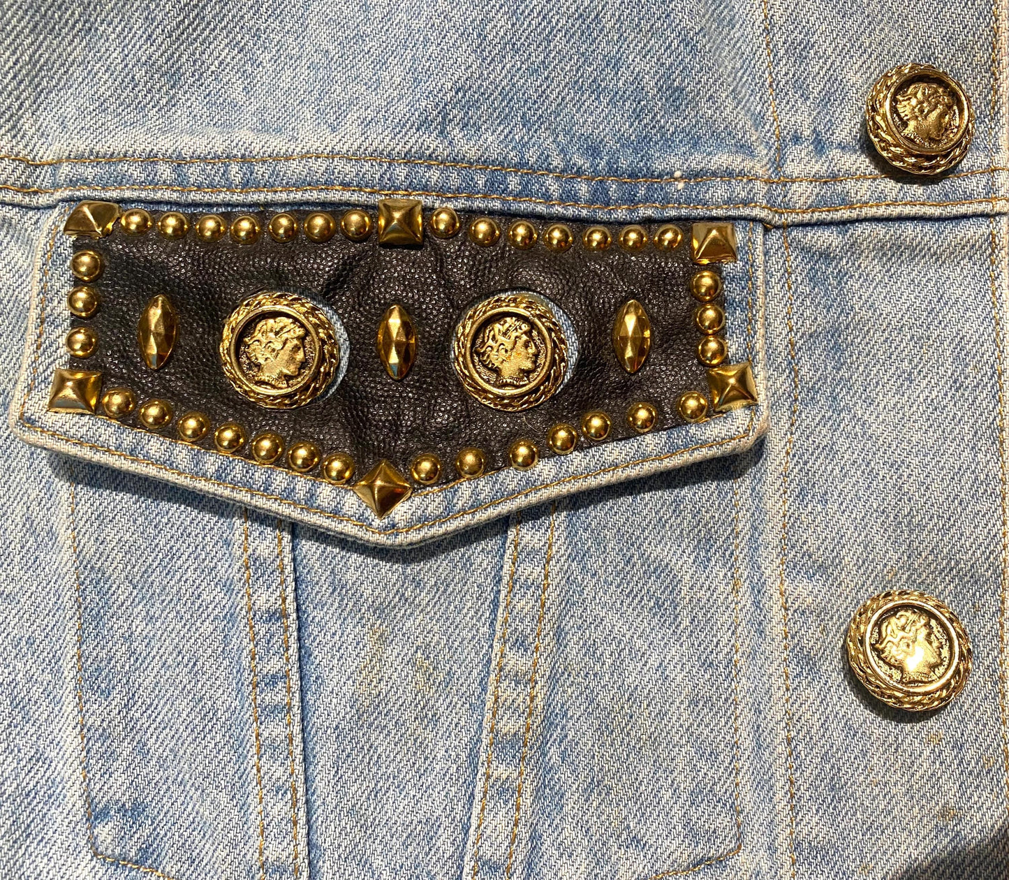Caché USA light blue denim vest customised w leather, golden jewel buttons & studs, sz L