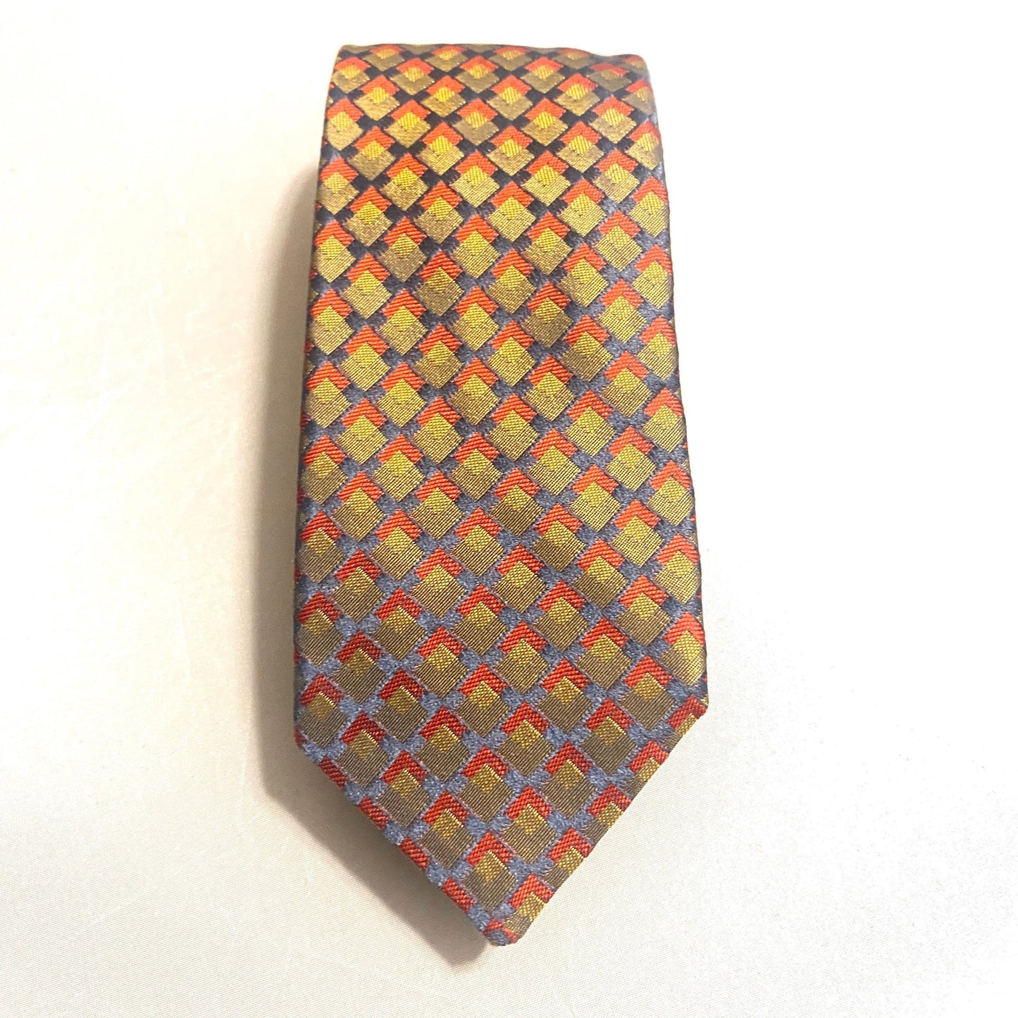 Pierre Cardin 70s slim ambiguously colors geometrical allover silk tie, red blue yellow green