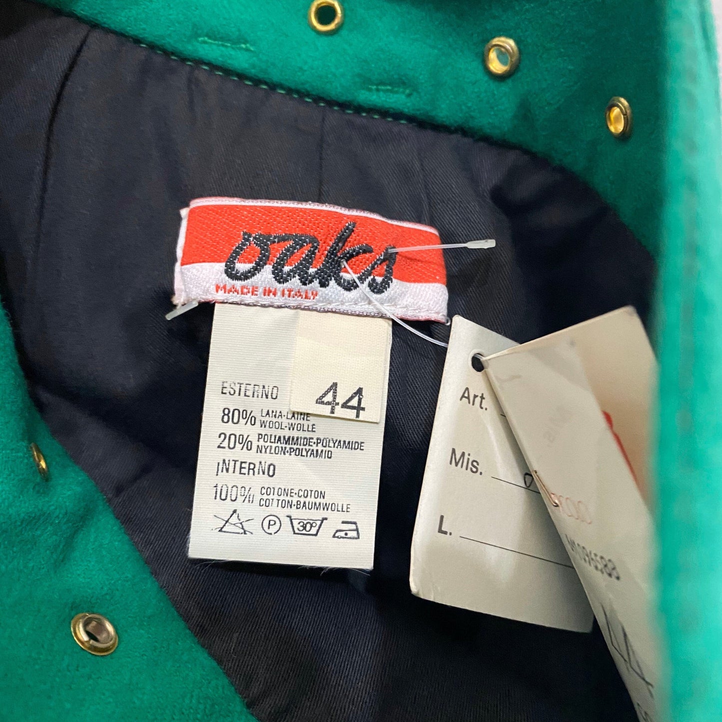 Ferrè Oaks vintage green wool skirt with golden cutoff studs and rocking zipper pocket, 90s NOS