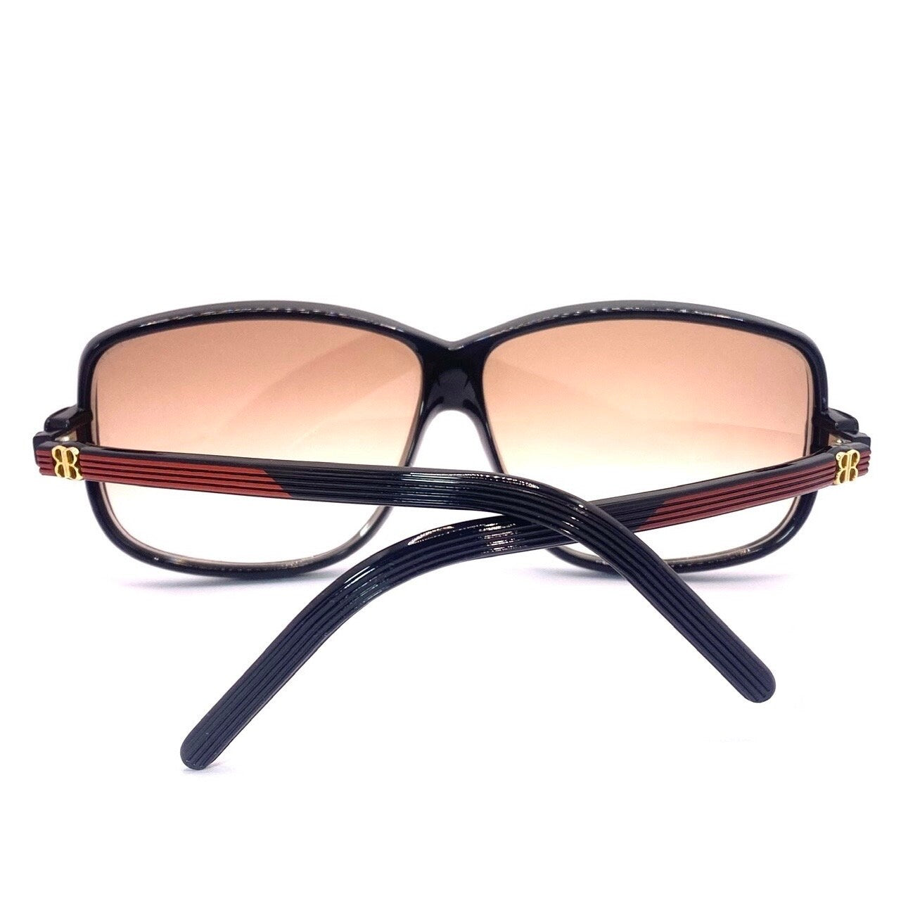 Balenciaga 2026 NR oversized black sunglasses with red carved stripes and golden logo, 80s Made in France