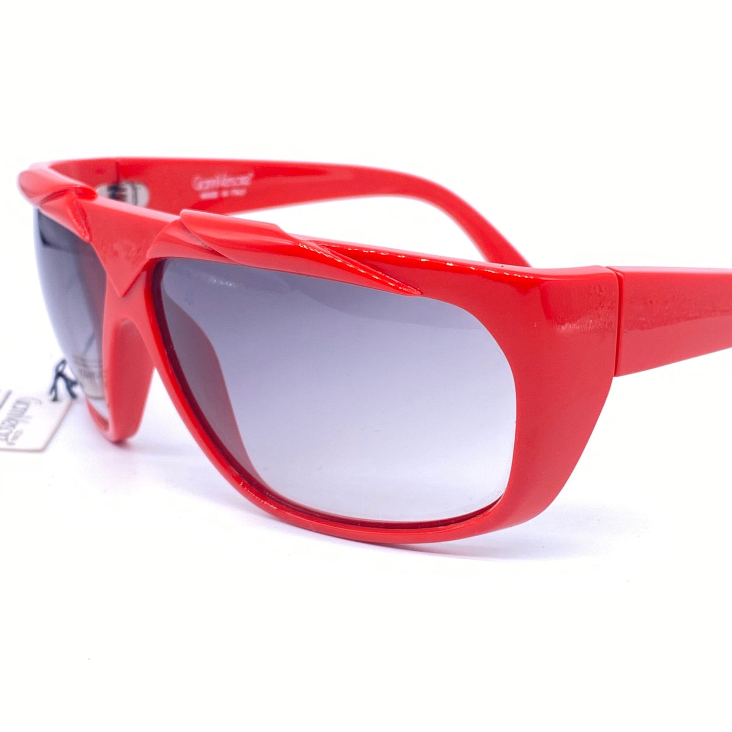 Gianni Versace red wrap modernist sunglasses with geometrical carvings, Italy 1980s NOS