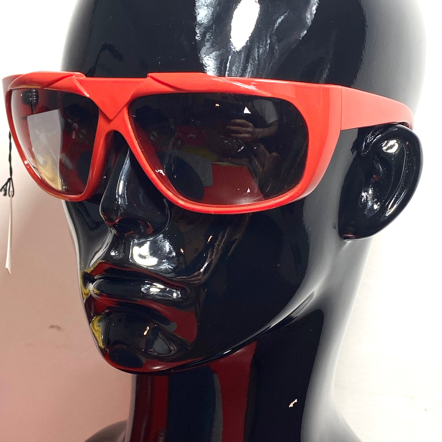 Gianni Versace red wrap modernist sunglasses with geometrical carvings, Italy 1980s NOS
