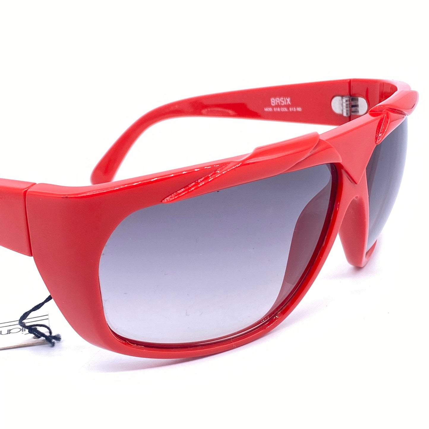 Gianni Versace red wrap modernist sunglasses with geometrical carvings, Italy 1980s NOS