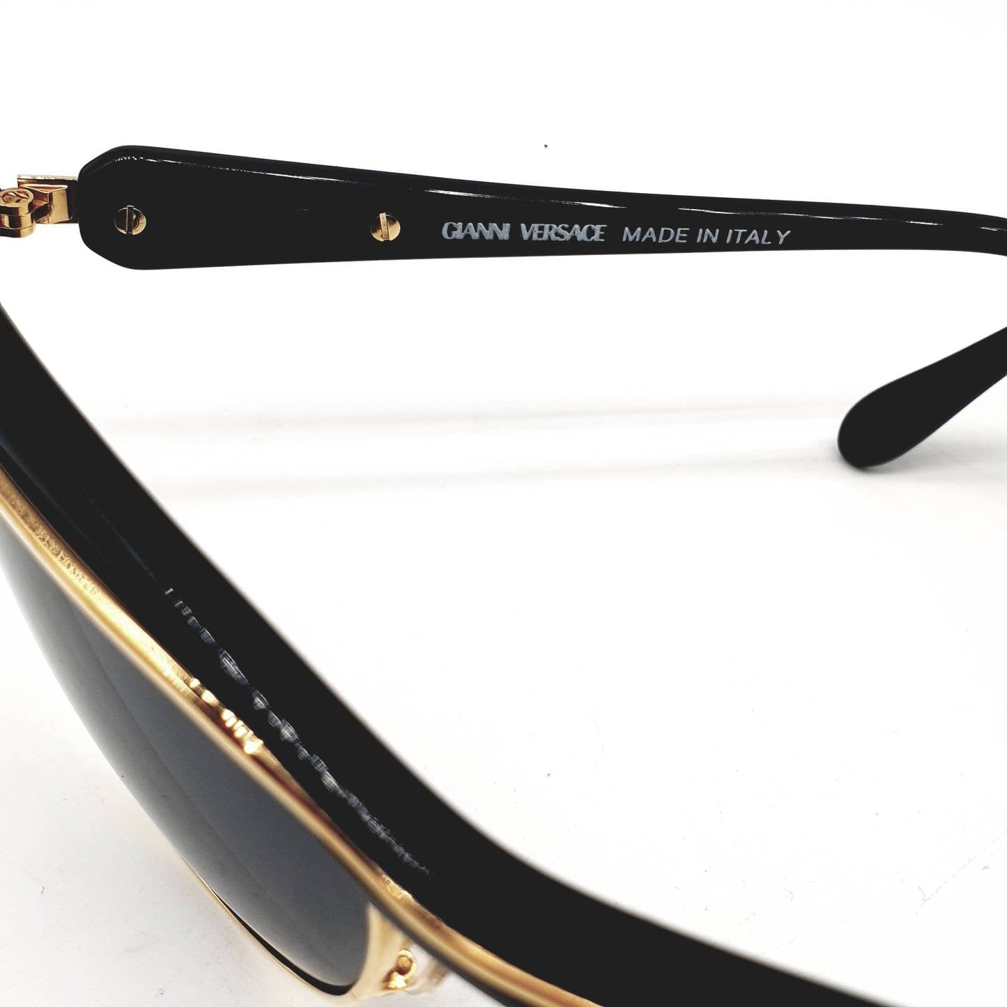 Gianni Versace S10 black cateye sunglasses with gold carved logo on lefth temple NOS 90s