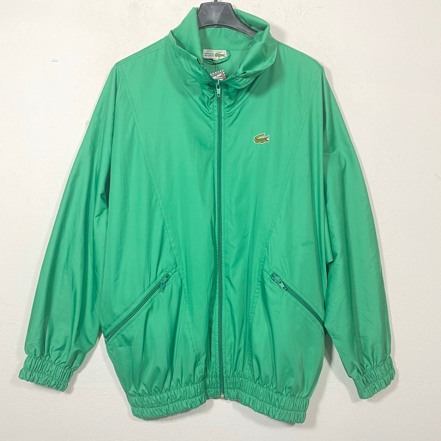 Lacoste 90s primary green windbreaker jacket with bat sleeves, size 44