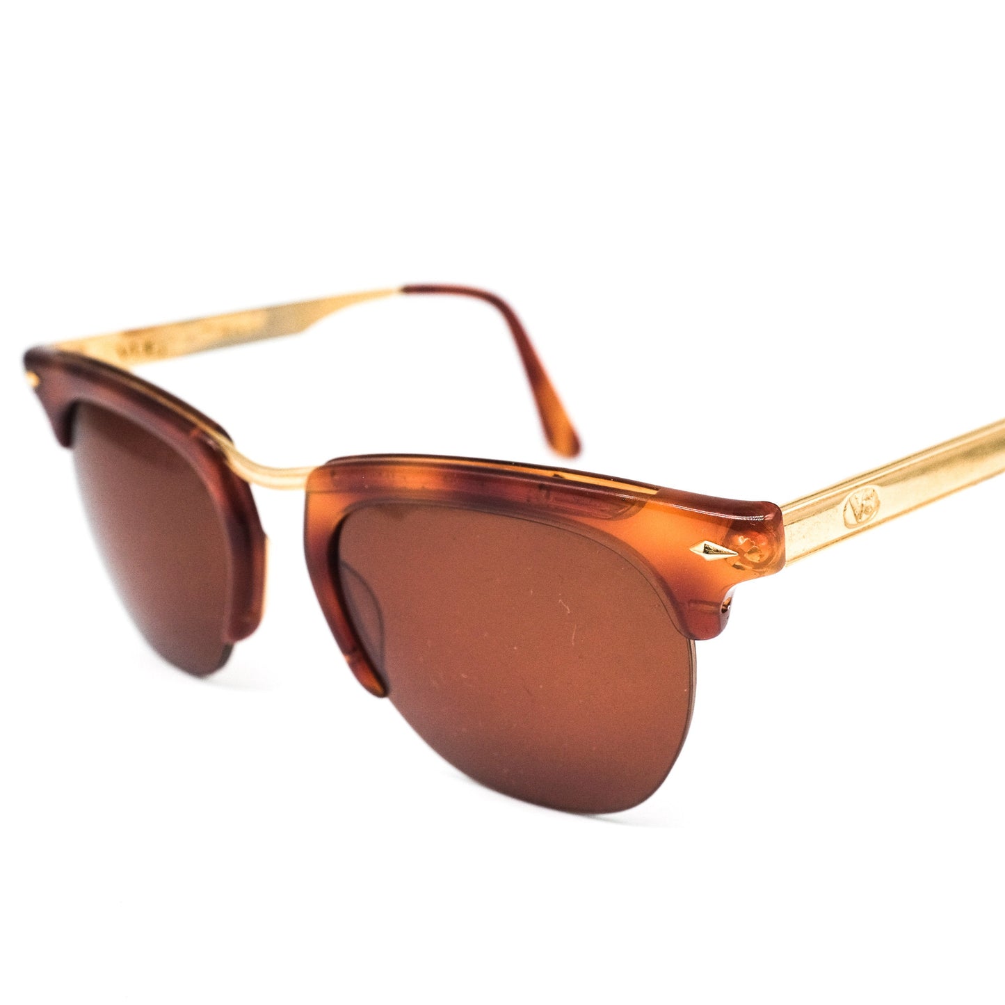 Vogue classy cello sunglasses in brown tortoise and golden metal paired with dark brown lenses, 1990s NOS.