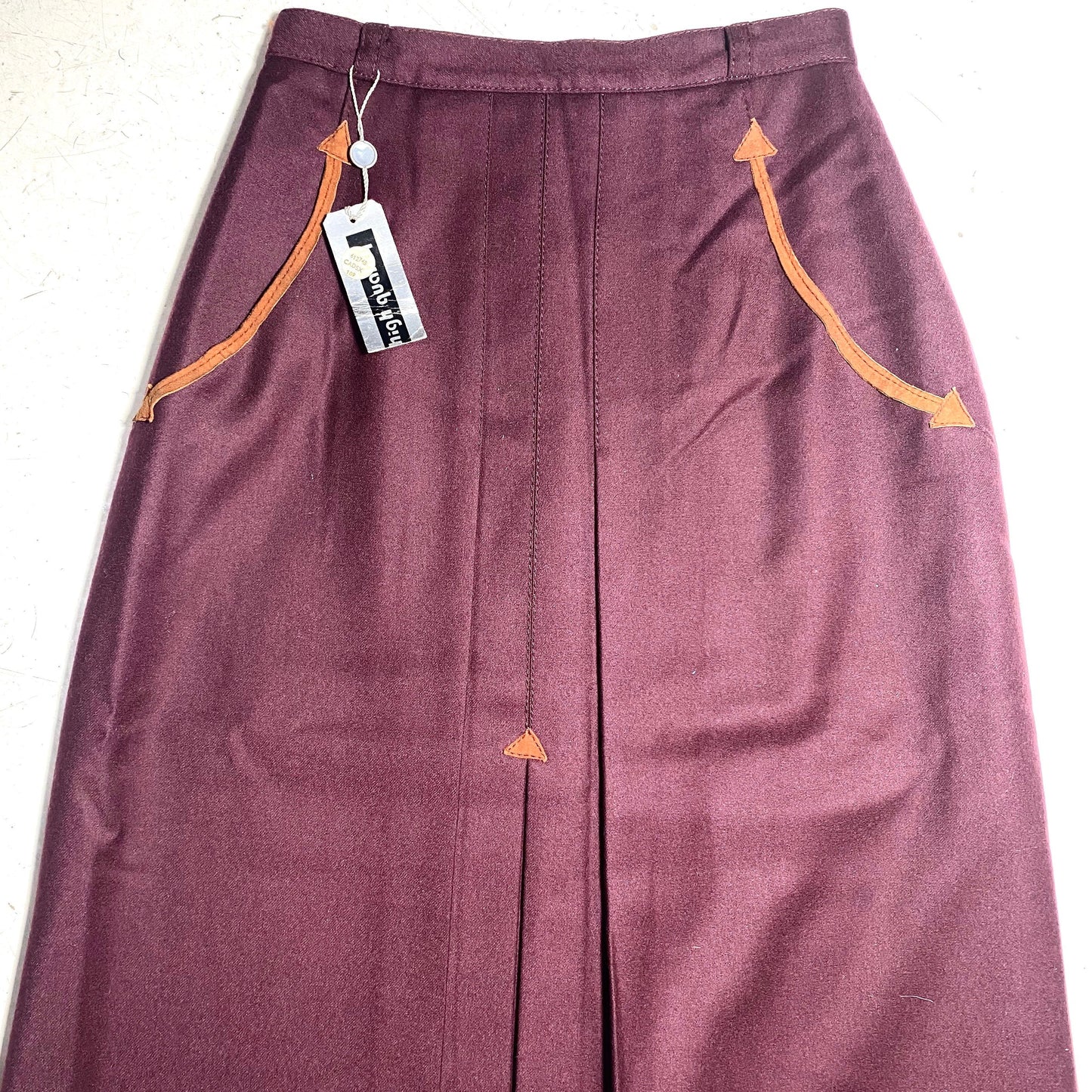1970s NOS burgundy pure new wool skirt with brown suede details, made in Italy new with tags.