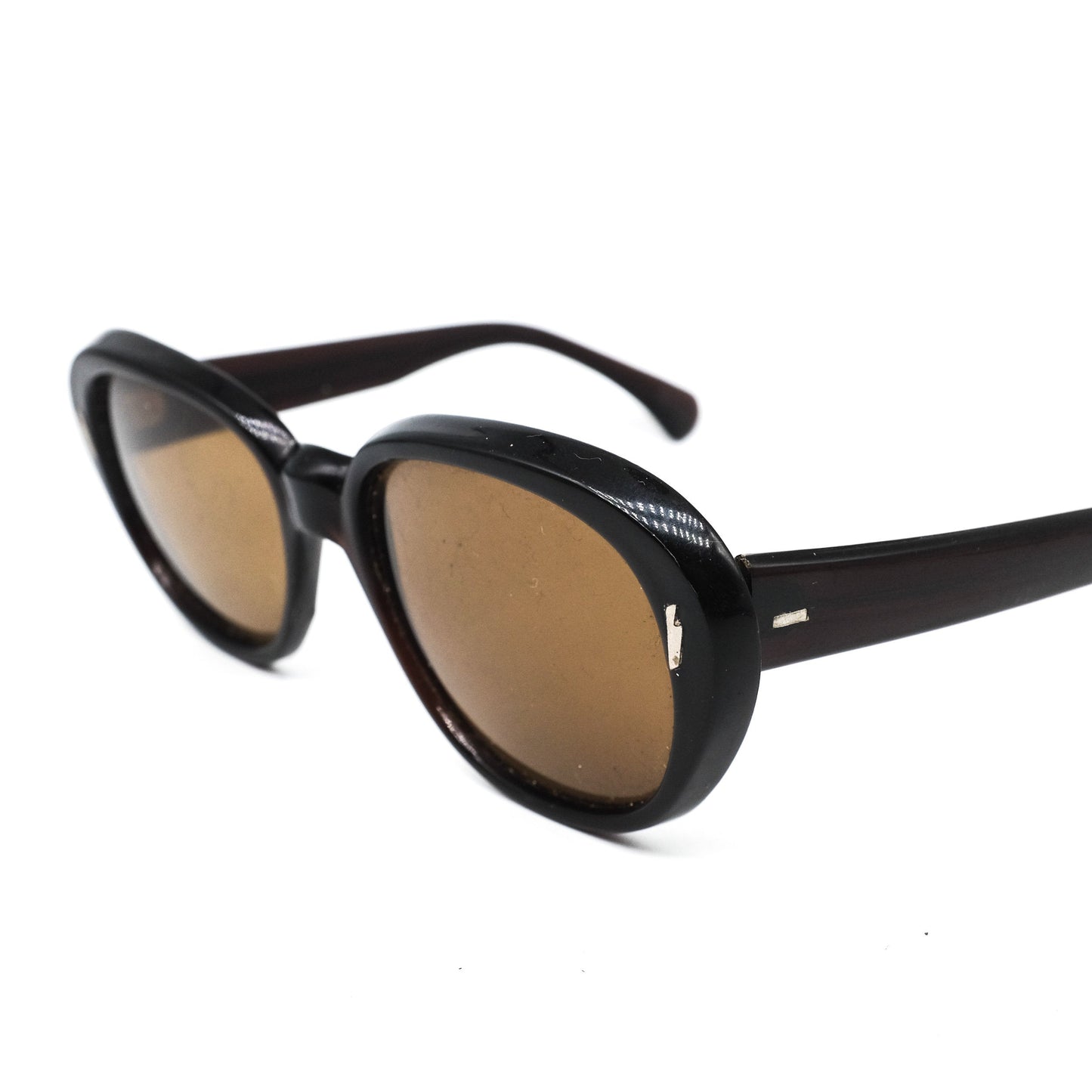 Vintage oval black acetate sunglasses with brown lenses and golden metallic pins. Nos 80s