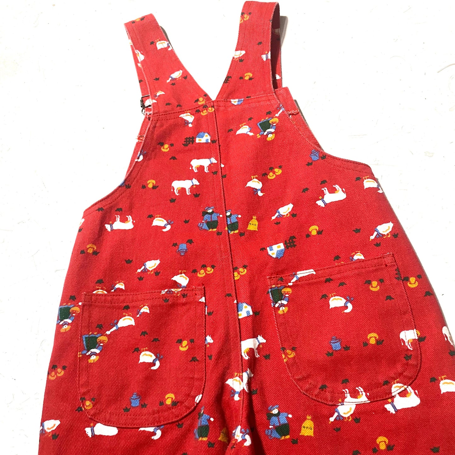 Fancy kids red dungarees with farmers / animals allover, cute and minty sz 3 years 94cm