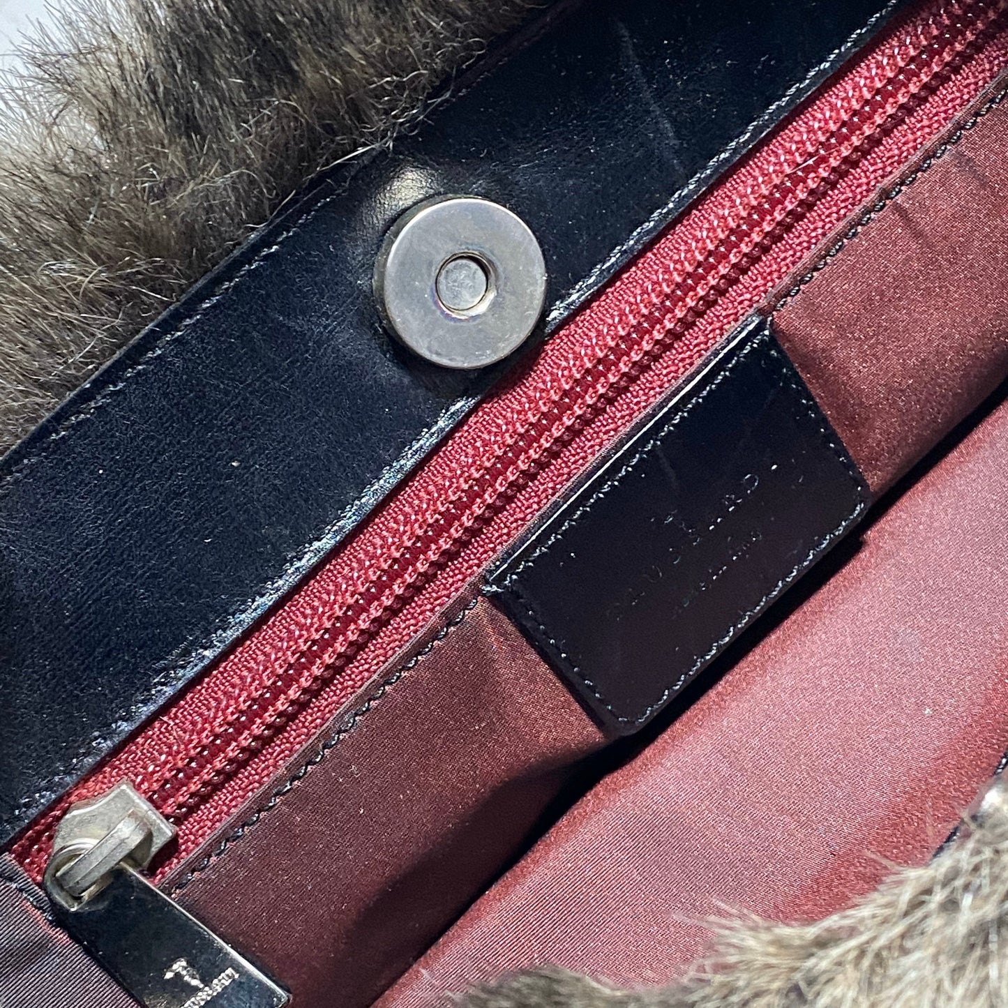 Trussardi 90s faux fur hand bag with black leather handles, in mint condition