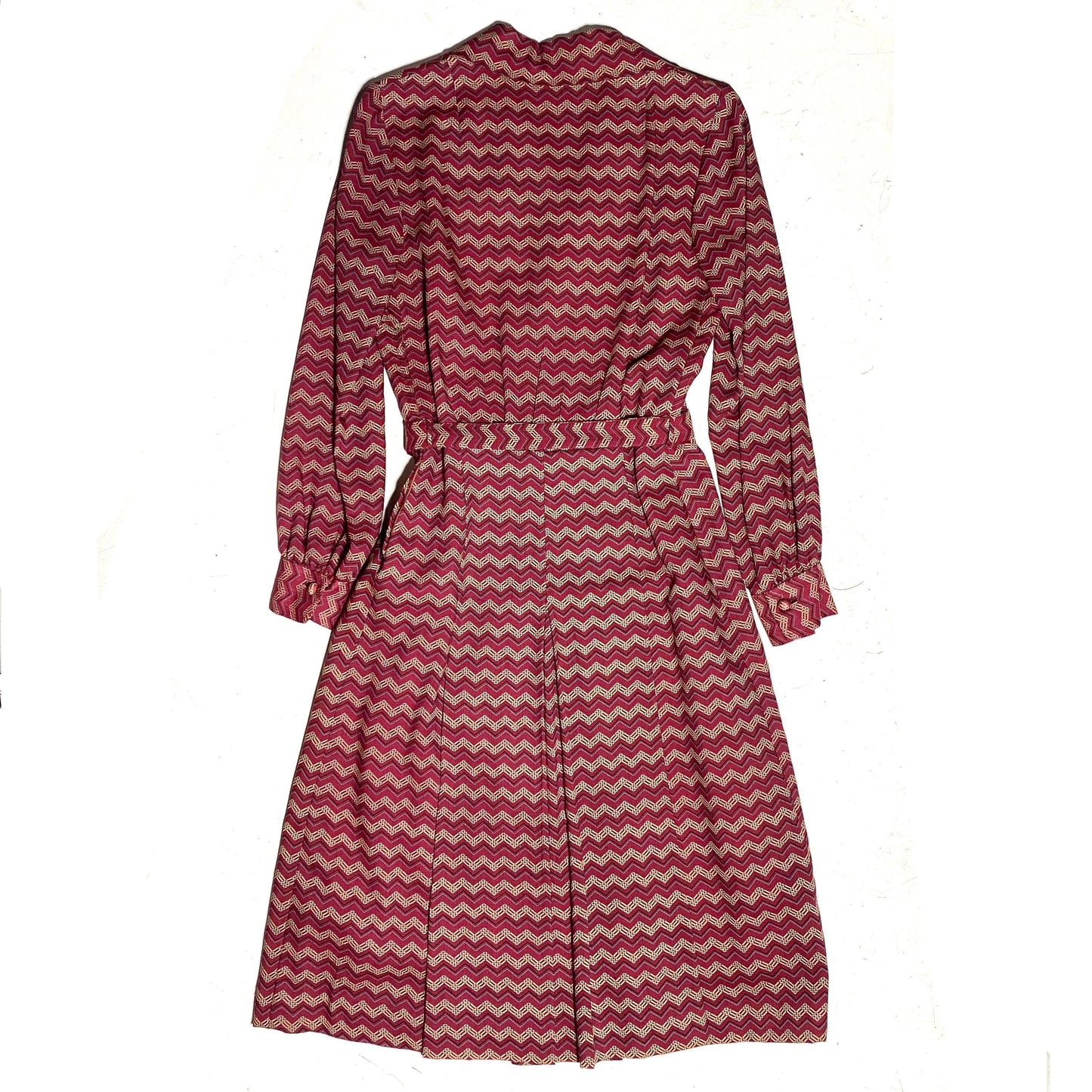 1970s burgundy cotton chevron allover dress with satin lining, matching belt, mint condition.
