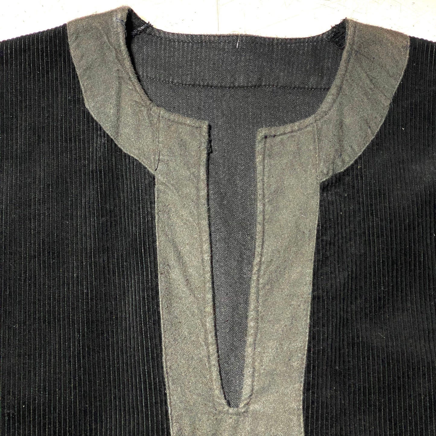 Tailor made black corduroy dress with deep keyhole collar, great condition