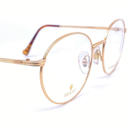 Gucci GG 1273 round gold plated metal frames made in Italy, 1980s NOs