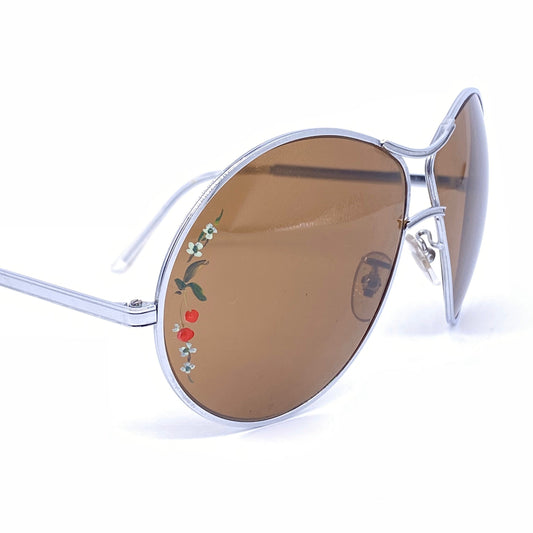 1960s oversized sunglasses with hand painted floral motif on lenses, unique