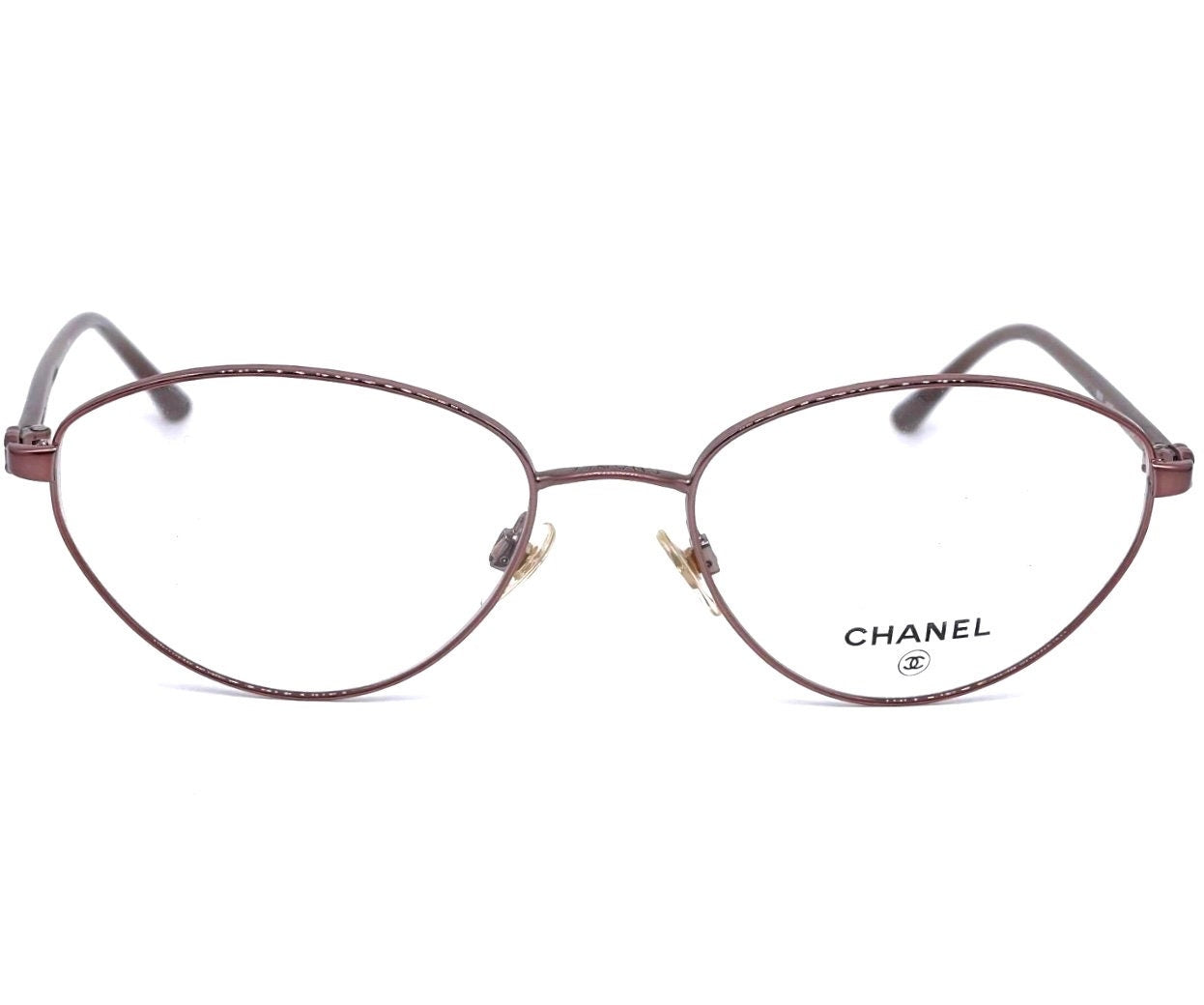 Chanel 2012 eleganti montature ovali da donna in rame lucido logo CC, NOS anni '90 come nuovo