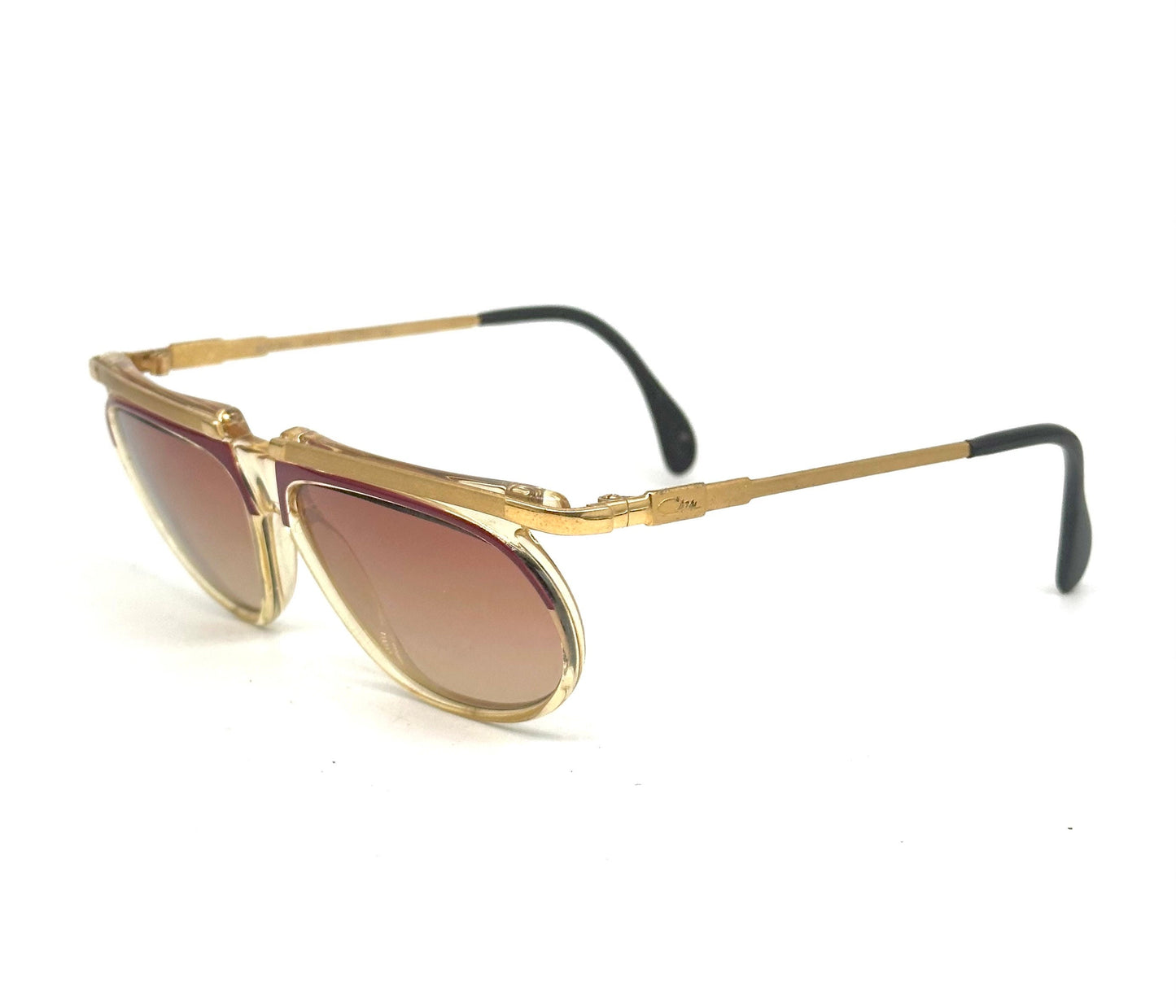 Cazal mod. 335 avant garde clear/red cello sunglasses w golden metal browline and temples, NOS 80s W Germany