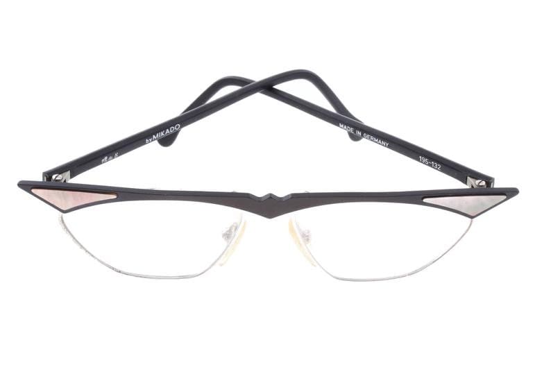 MIKADO modernist cateye frames in matt black metal w pointed brows & pearl inserts, Germany NOS 80s