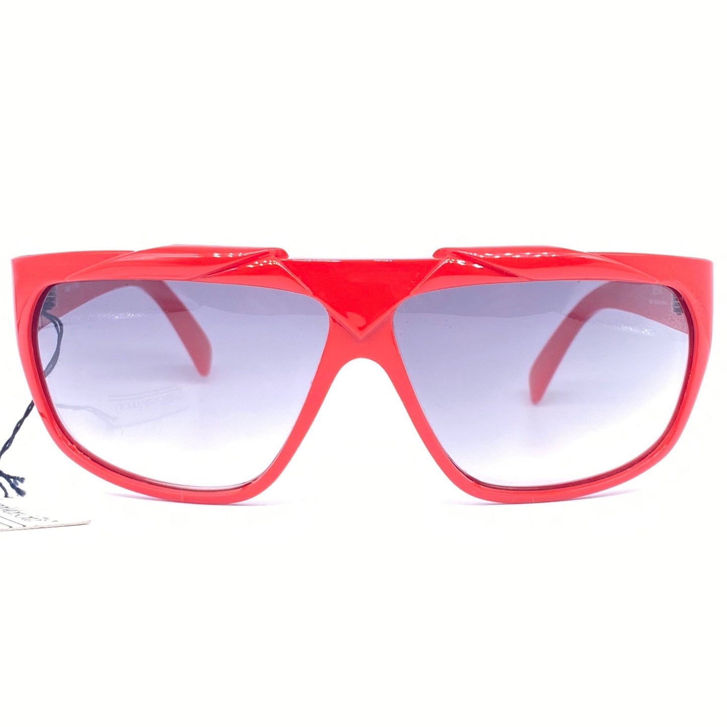 Gianni Versace red wrap modernist sunglasses with geometrical carvings, Italy 1980s NOS