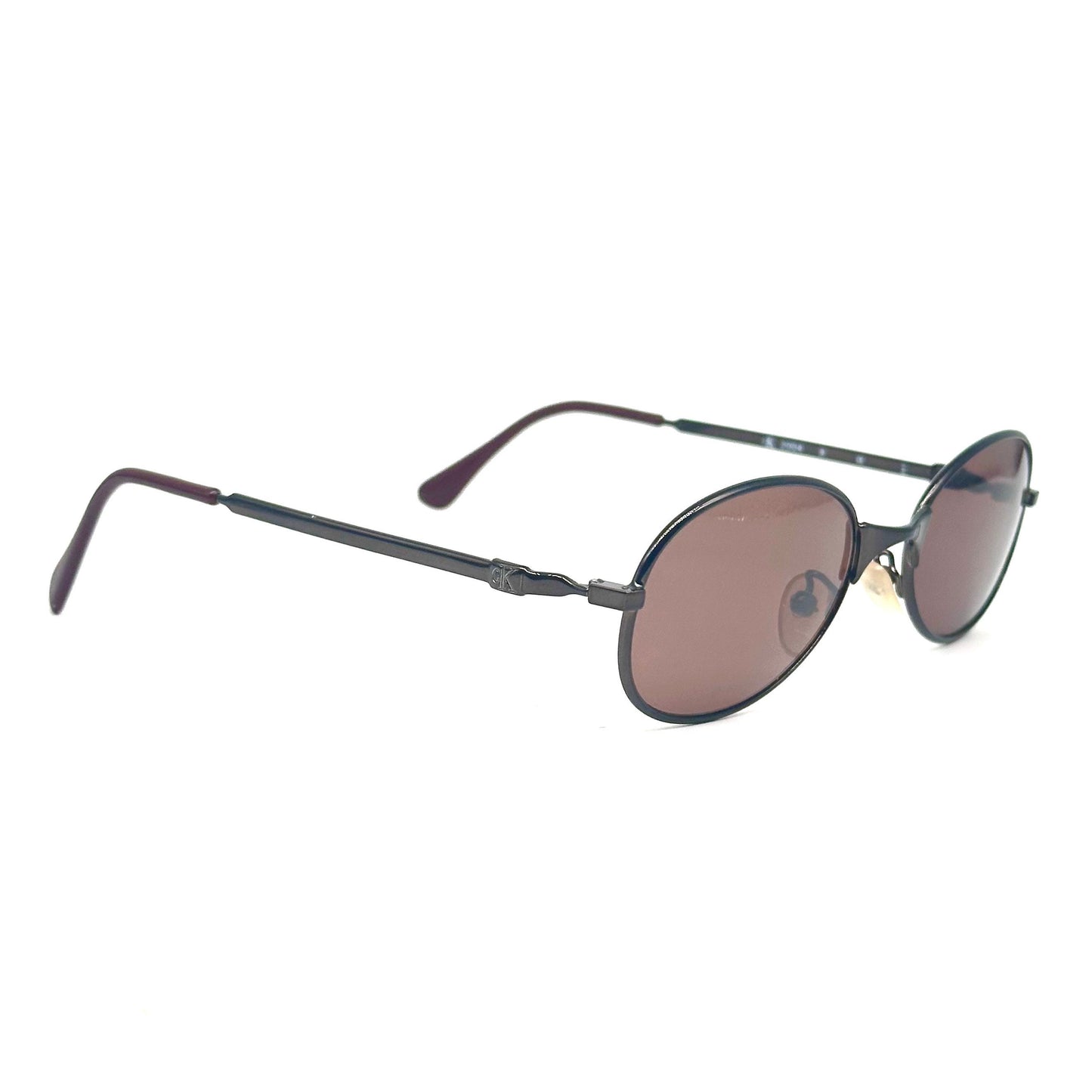 Calvin Klein 2004 gunmetal oval shaped sunglasses made in Italy, 90s NoS