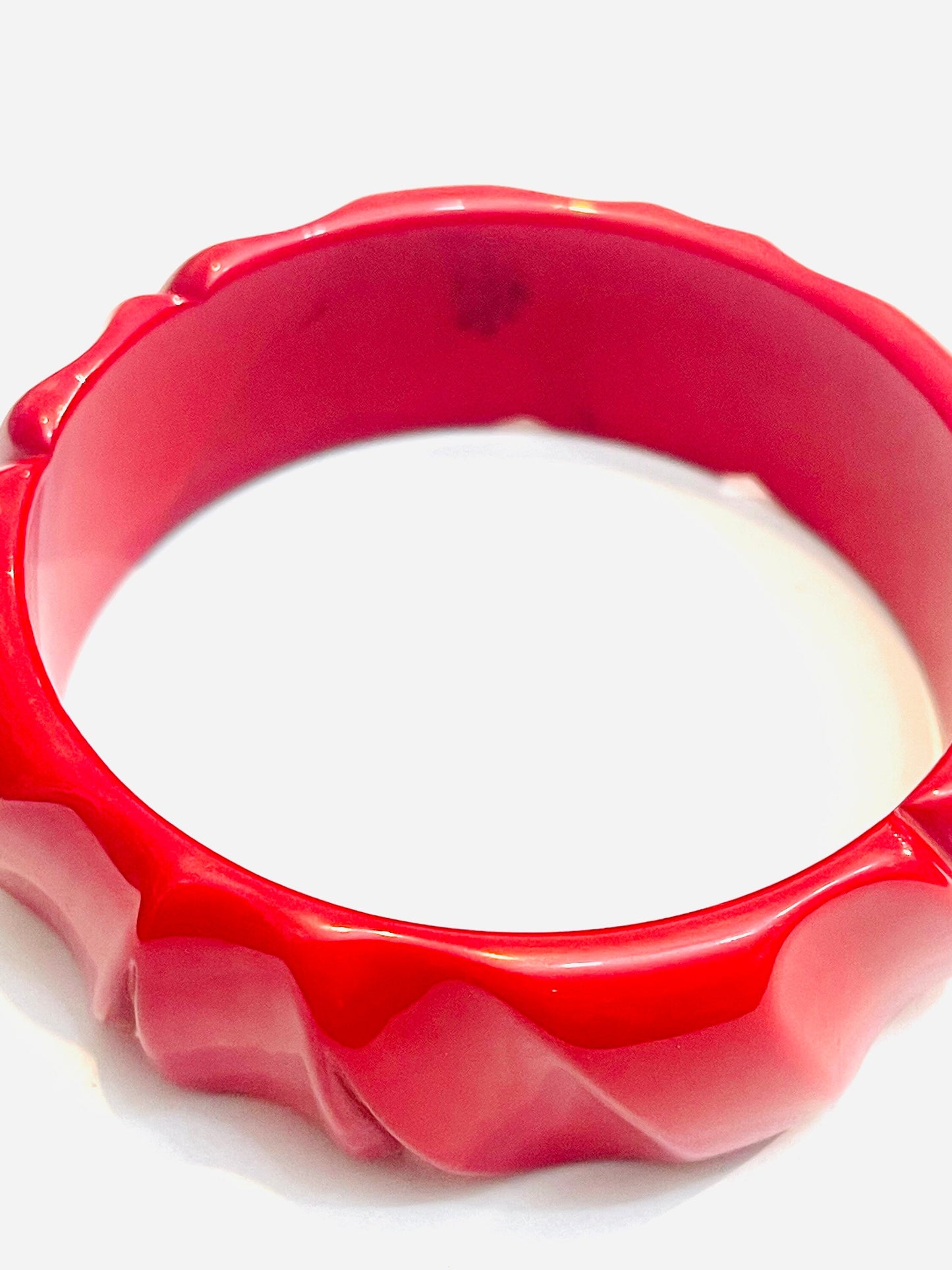 Antique coral red hand carved Bakelite bracelet, 1950/1960s circa