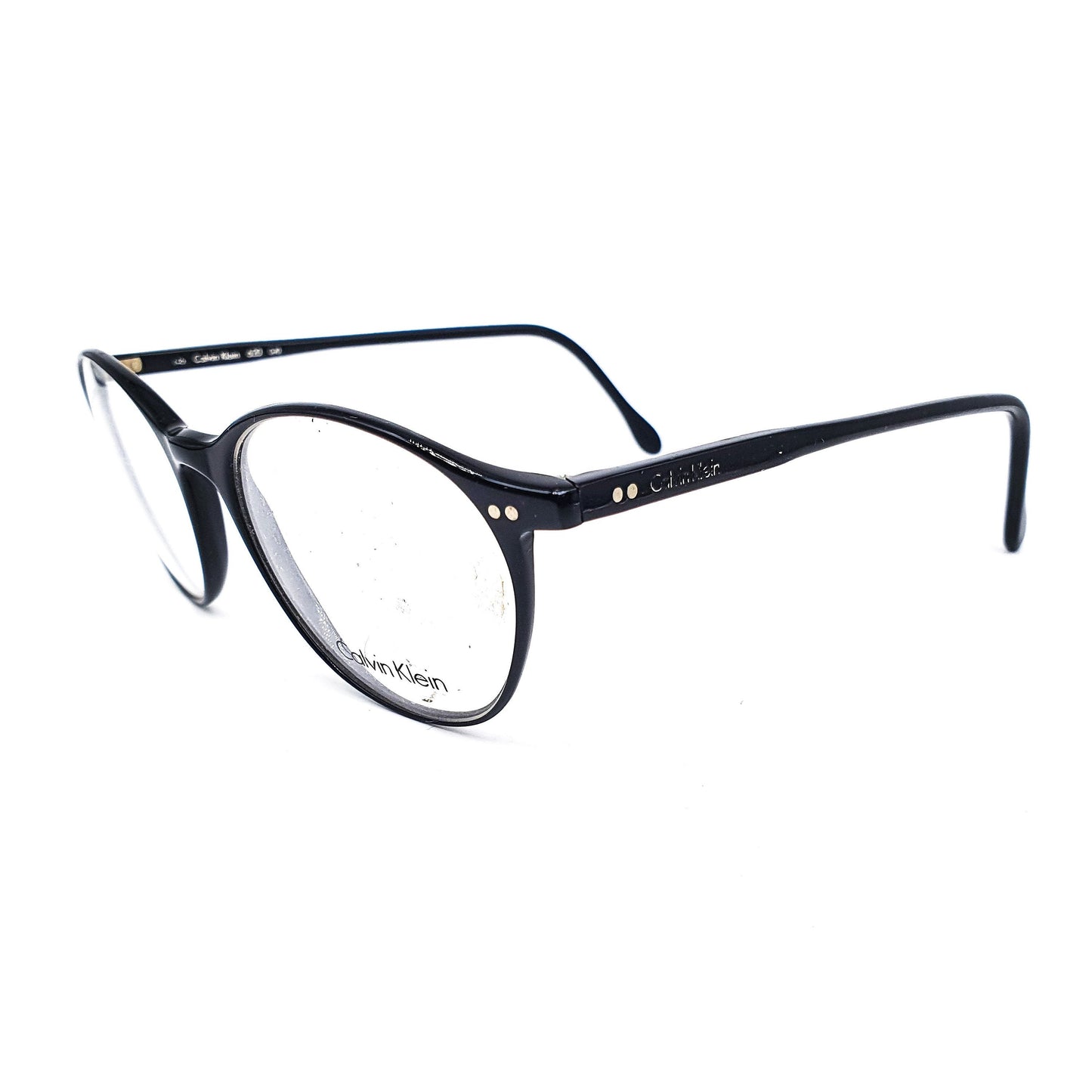 Calvin Klein CK620 round black glossy cellulose acetate eyeglasses frames with classic rivets details NOS 90s Italy