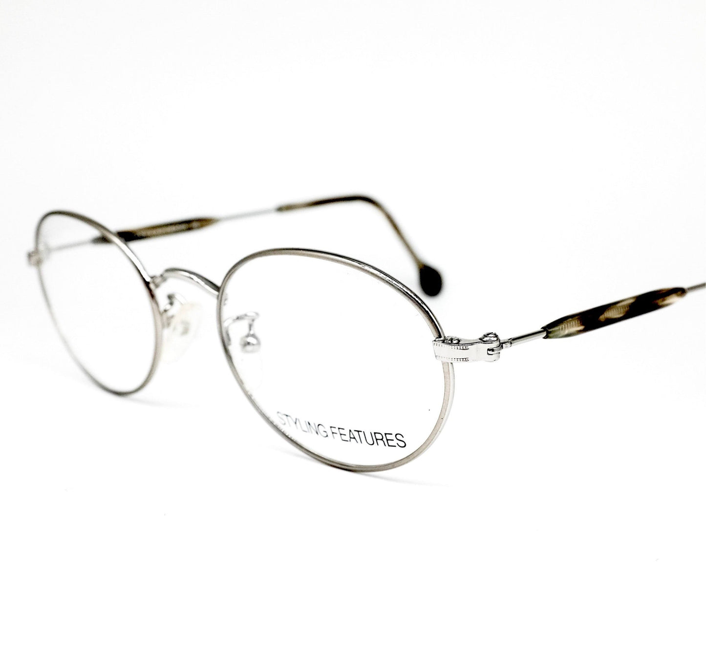 Dollond & Aitchison montature per occhiali da vista in metallo argento opaco di forma ovale minimale, NOS anni '80