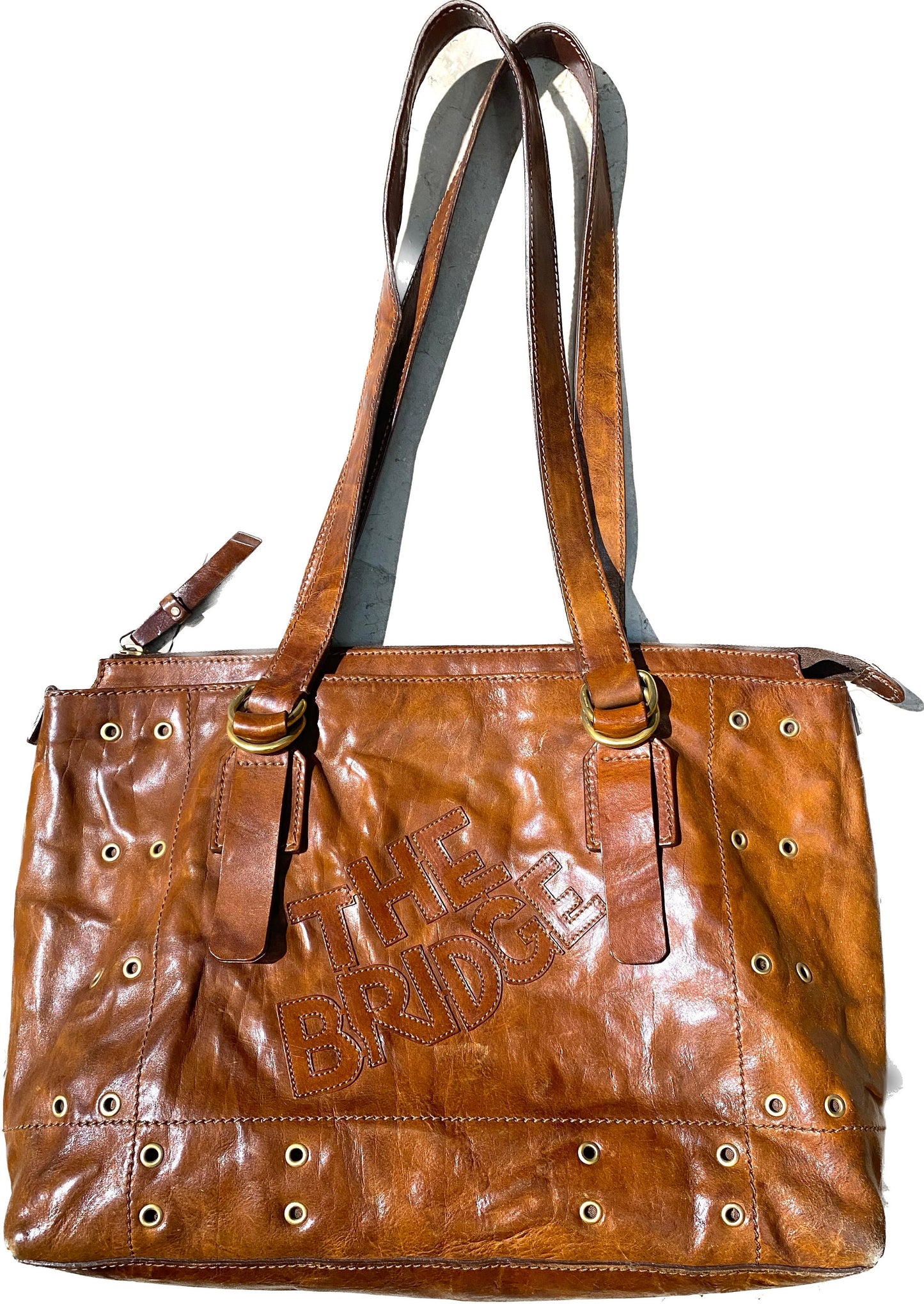 The Bridge tan leather shoulder bag with golden eyelets/studs,  1980s Italy Mint