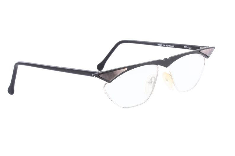 MIKADO modernist cateye frames in matt black metal w pointed brows & pearl inserts, Germany NOS 80s