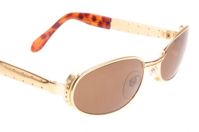 Oval steampunk sunglssses in silver or gold metal with side cup and embossed details, Italy 90s NoS