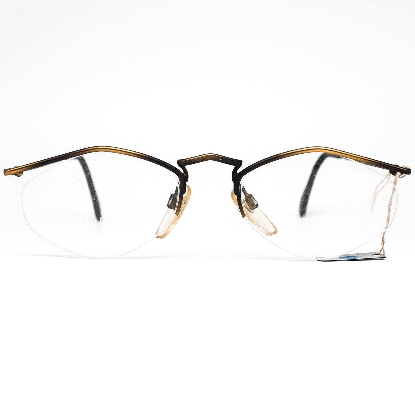 YABI-spirit minimal matt gold metallic eyeglasses frames in rimless design with pointing browline, 1980s NOS Germany.