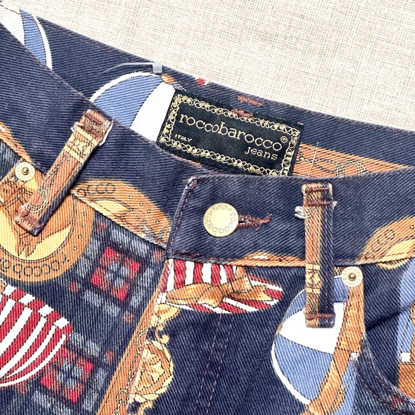 Roccobarocco vintage blue jeans with baroque print allover and horse riding themed designing size 31 90s