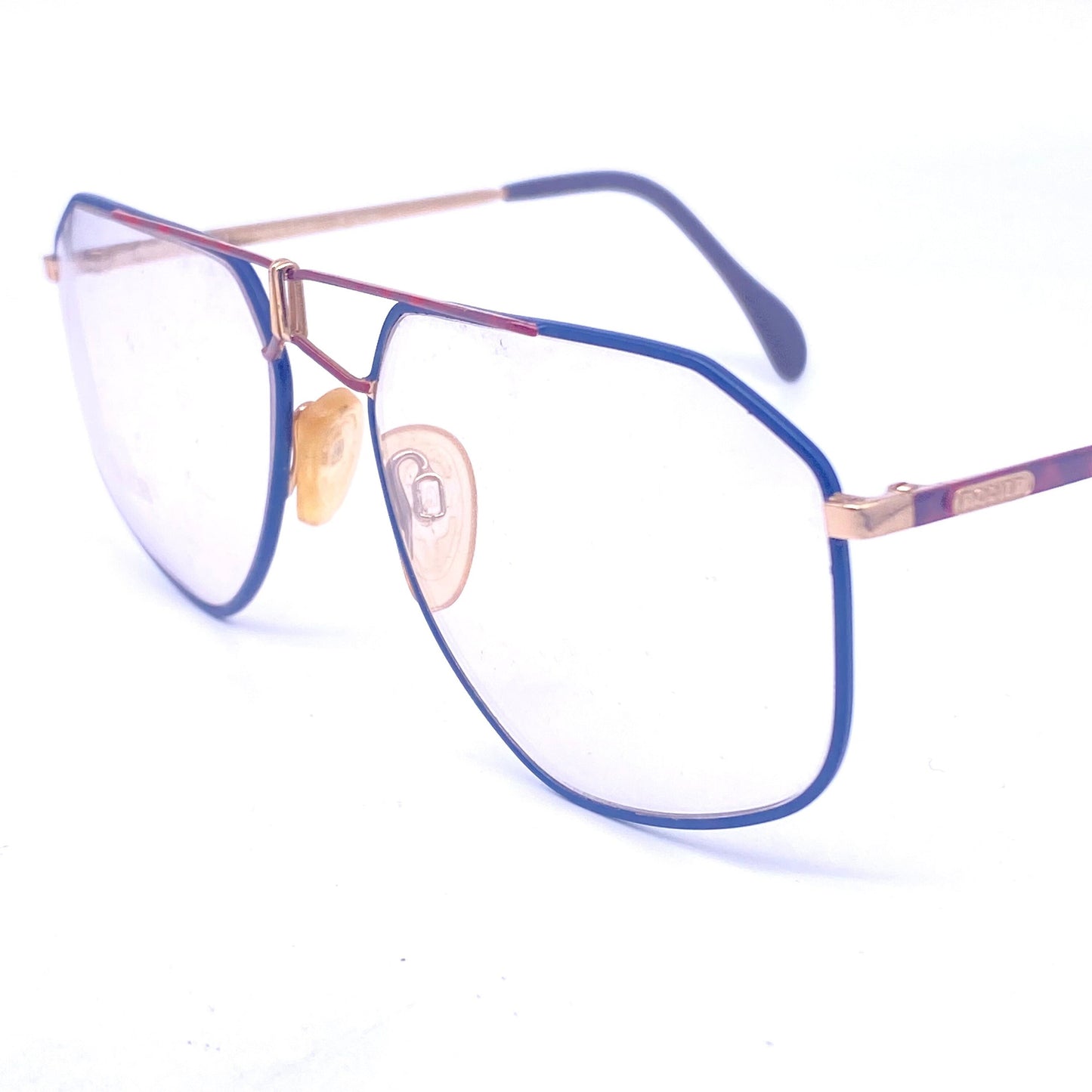Rodier W Germany golden metal aviator with red/blue enameled and cutoff details, NOS 80s