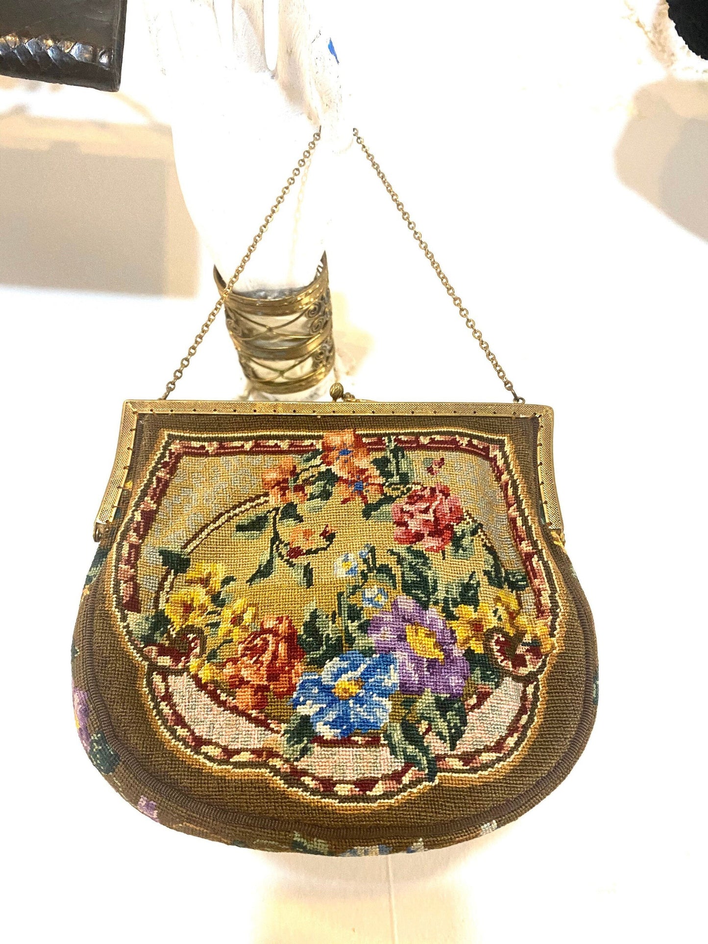 Auth. 1920s petit point crochet hand bag with floral motif and brass frame and chain, 1930s ca, mint condition.