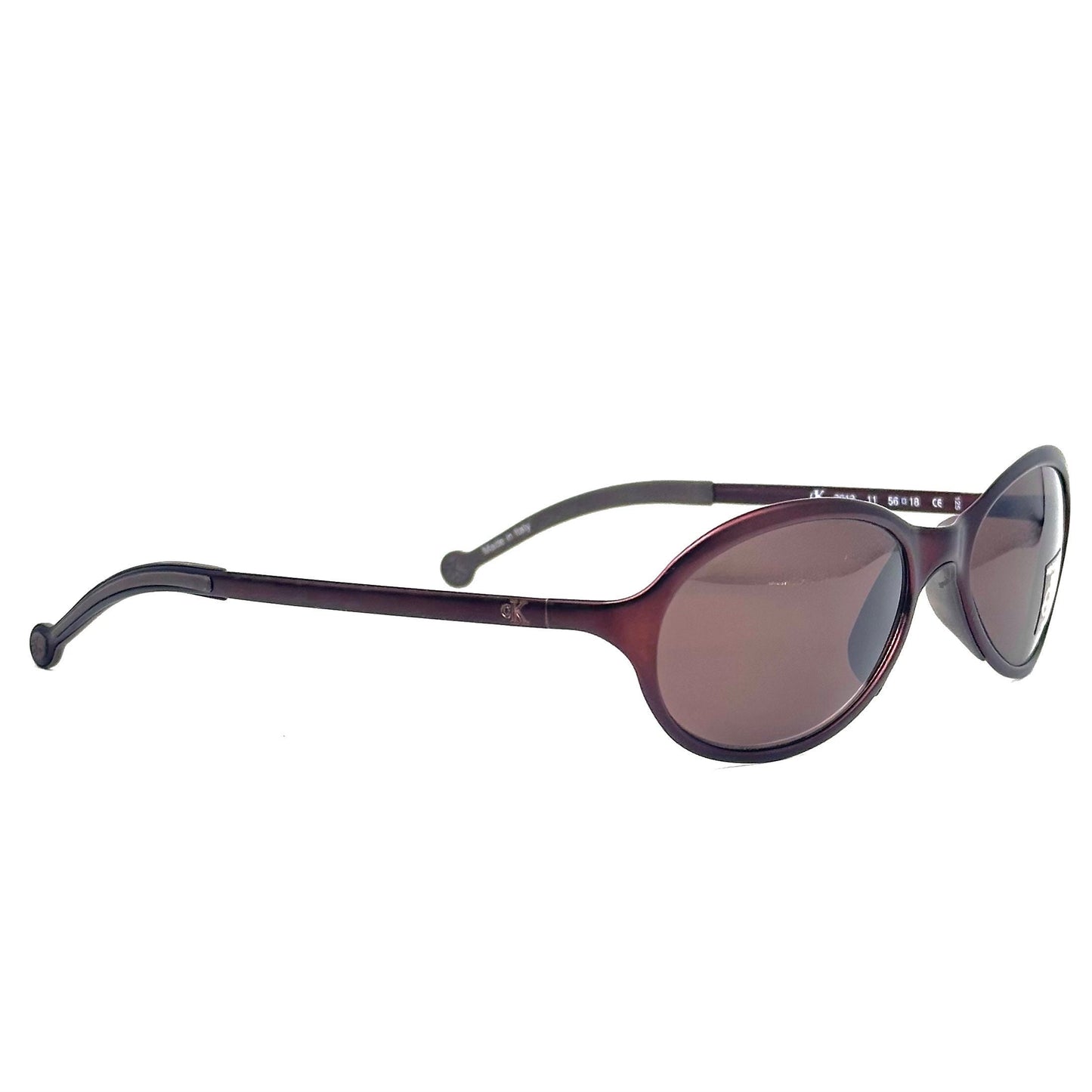 Calvin Klein 2012 modernist burgundy oval metal sunglasses made in Italy in the 90s, NOS