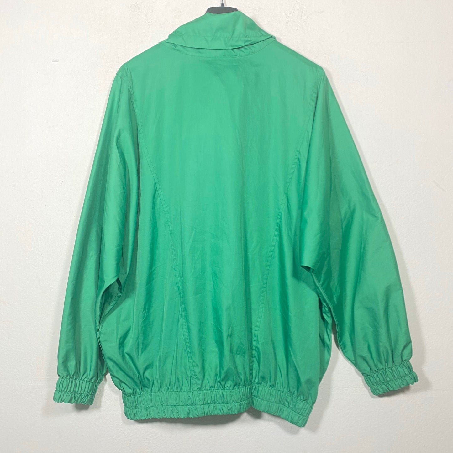 Lacoste 90s primary green windbreaker jacket with bat sleeves, size 44