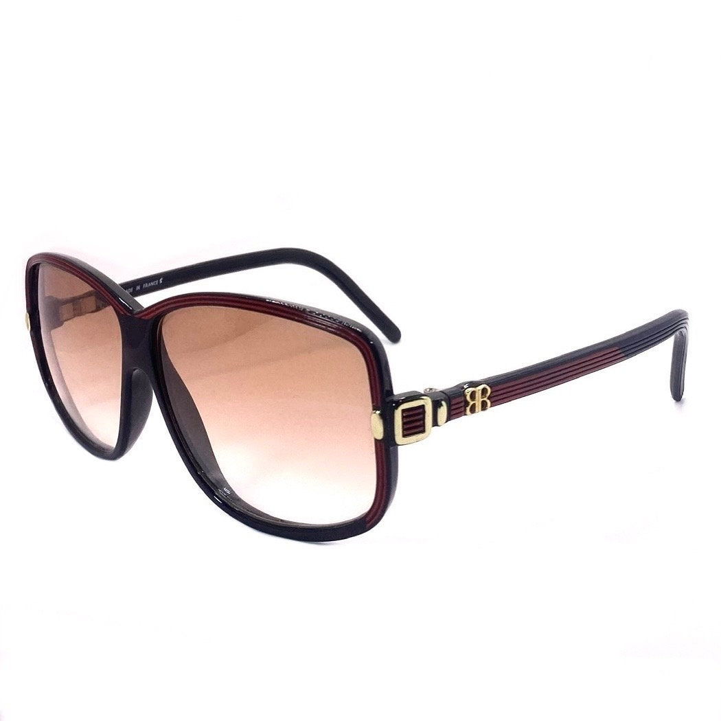 Balenciaga 2026 NR oversized black sunglasses with red carved stripes and golden logo, 80s Made in France