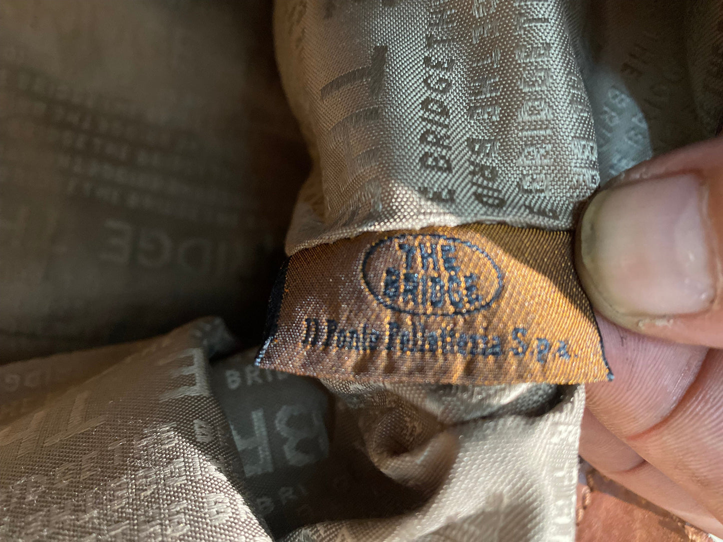 The Bridge tan leather shoulder bag with golden eyelets/studs,  1980s Italy Mint