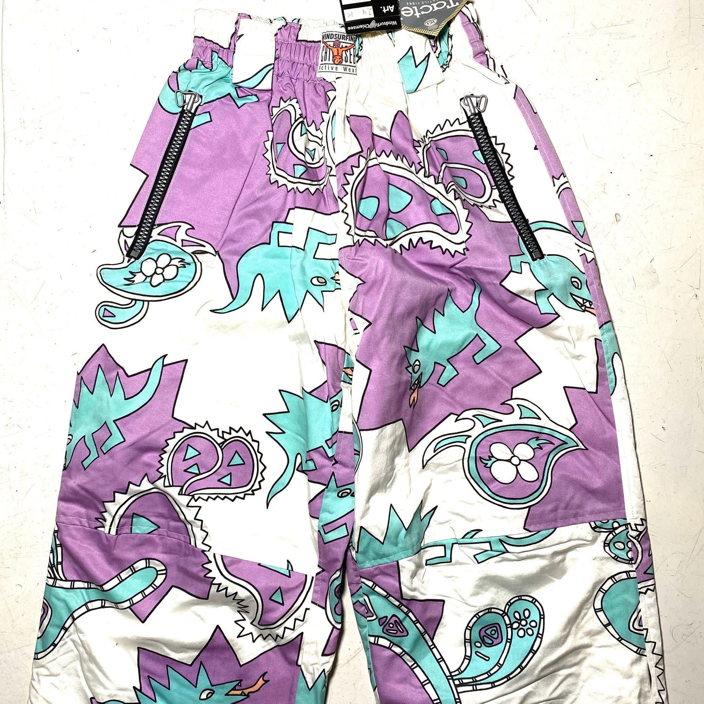 Jet Set purple / turquoise / white dragons / paisley crazy print windsurf padded tactel trousers, NOS 90s