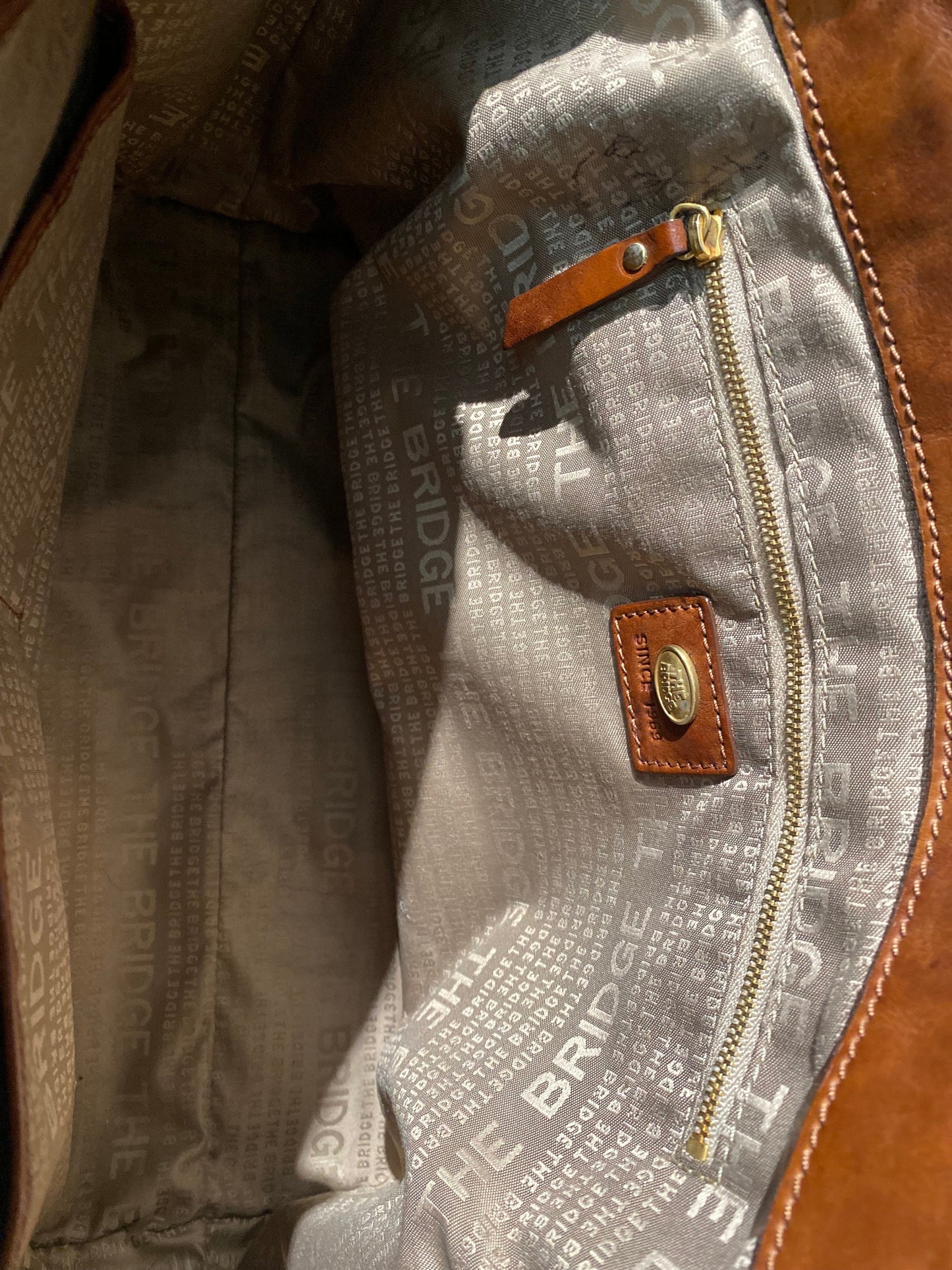 The Bridge tan leather shoulder bag with golden eyelets/studs,  1980s Italy Mint