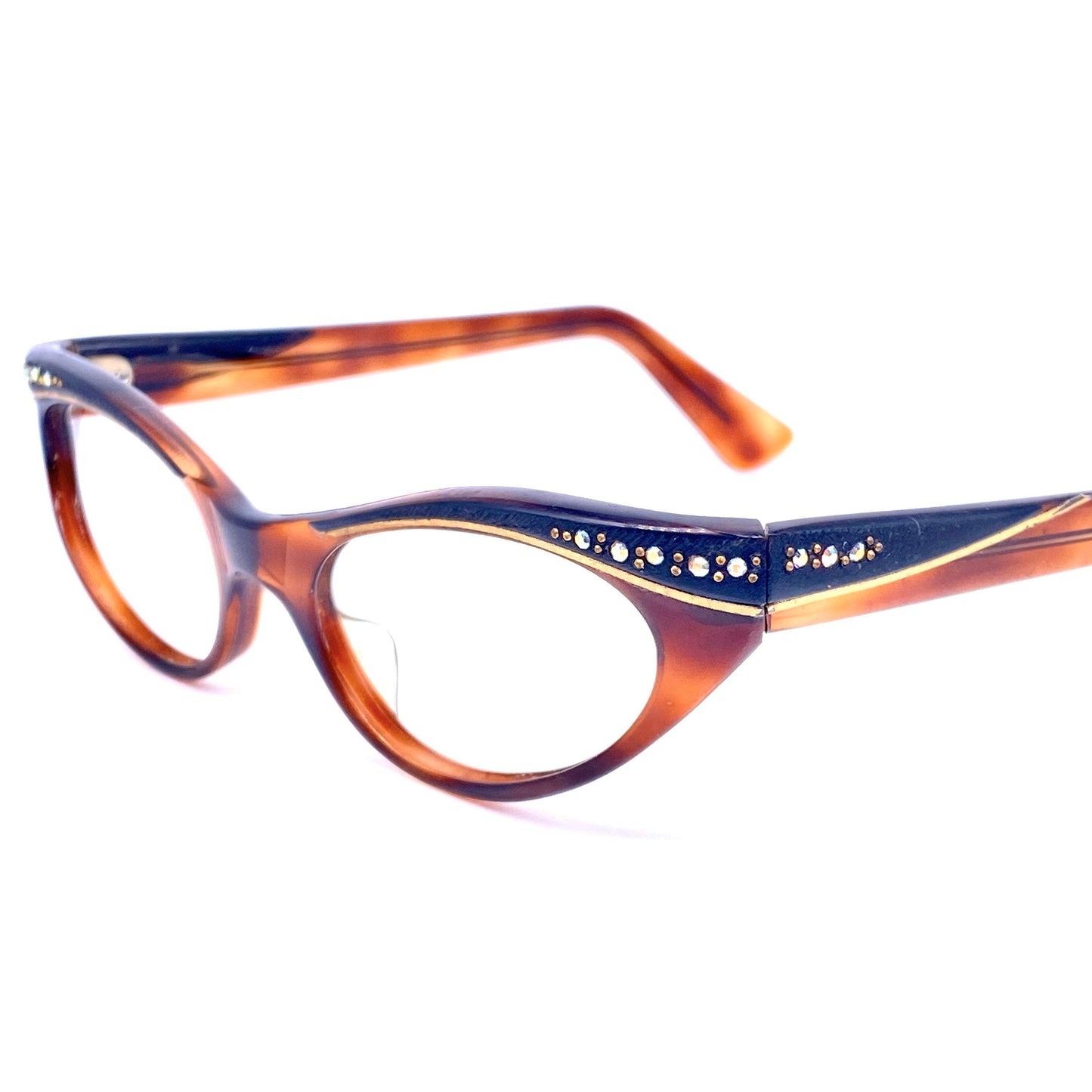 Black / tortoiseshell cateye eyeglasses with rhinestones and carved gold details, France 1950s NOS
