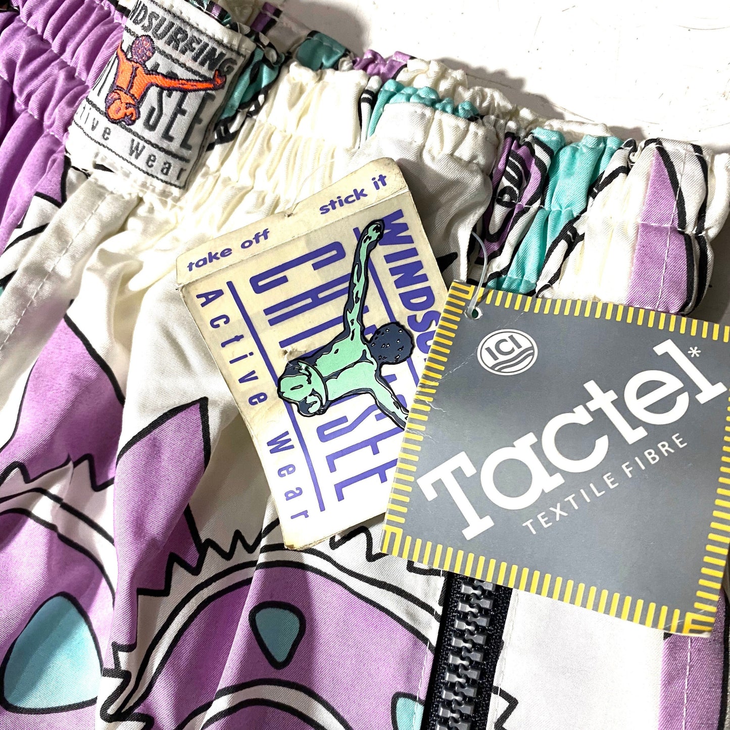 Jet Set purple / turquoise / white dragons / paisley crazy print windsurf padded tactel trousers, NOS 90s