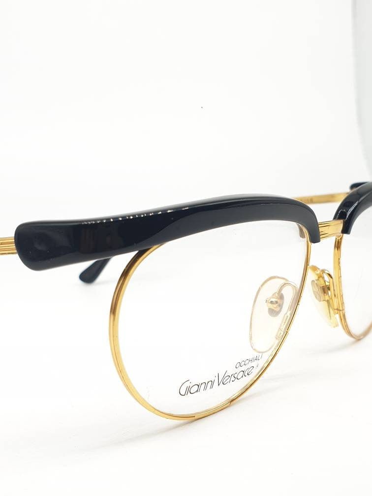 Gianni Versace V86 gorgeous oversized eyeglasses, black cutoff wings frame and golden temples, 90s NOS
