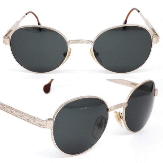 Gian Marco Venturi V932 classic oval minimal silver metallic sunglasses w/ black lenses in finely carved body 80s NOS Italy