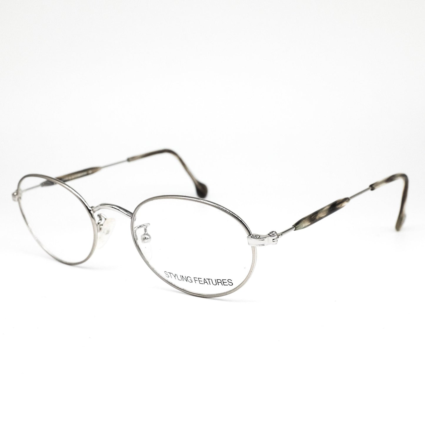 Dollond & Aitchison montature per occhiali da vista in metallo argento opaco di forma ovale minimale, NOS anni '80