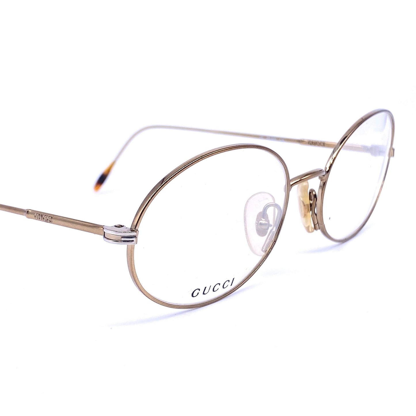 Gucci GG2633 thin oval eyeglsses frames coming in brass or gunmetal, NOS 90s Italy